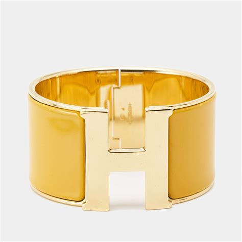 hermes gray pm clic clac yellow gold fashionphile|The official Hermes online store .